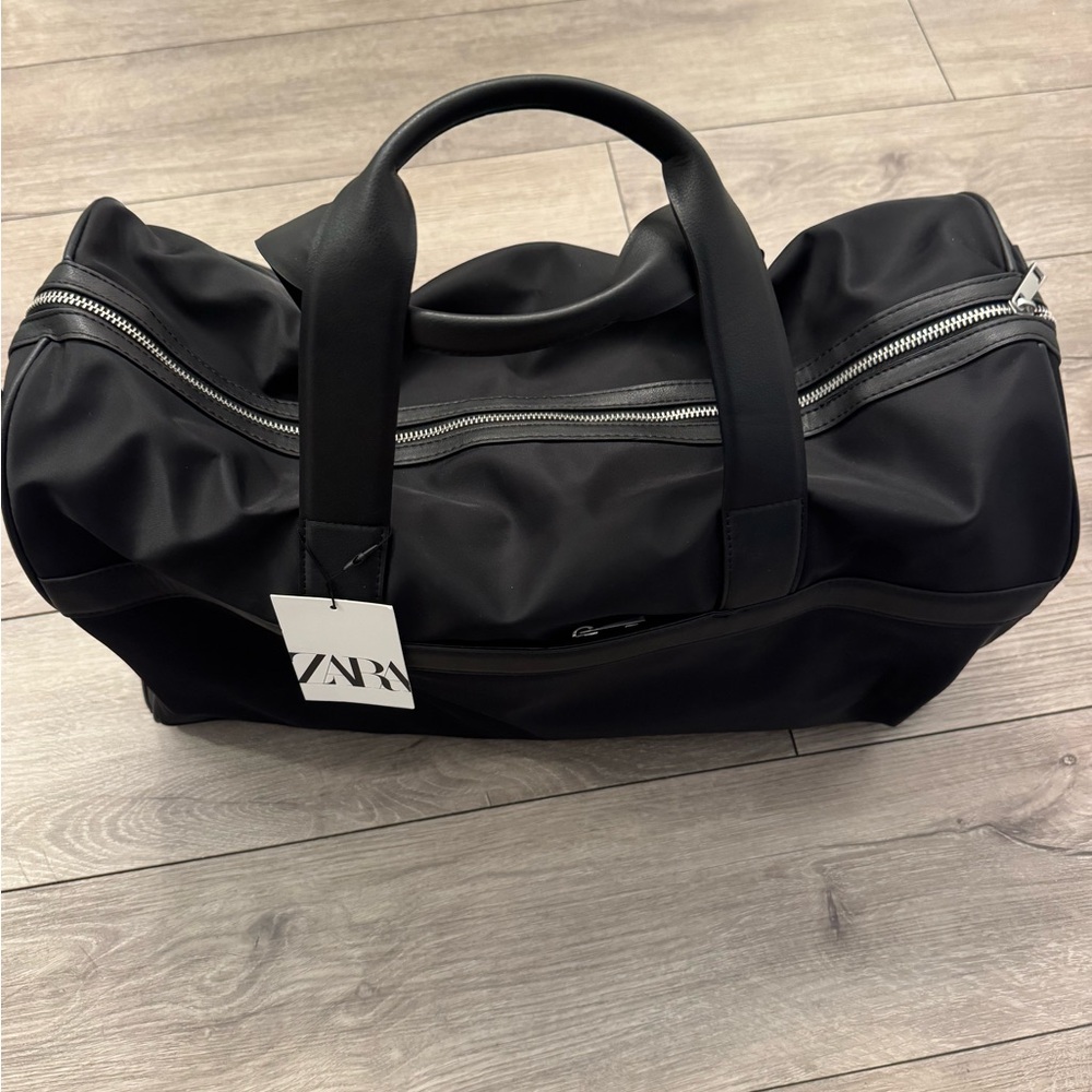 Zara Black Duffel Bag with Silver Accents